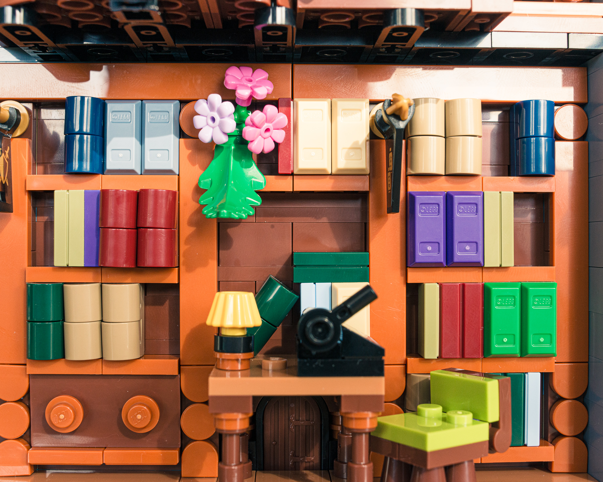 A front view of a bit of the first floor with books and a desk