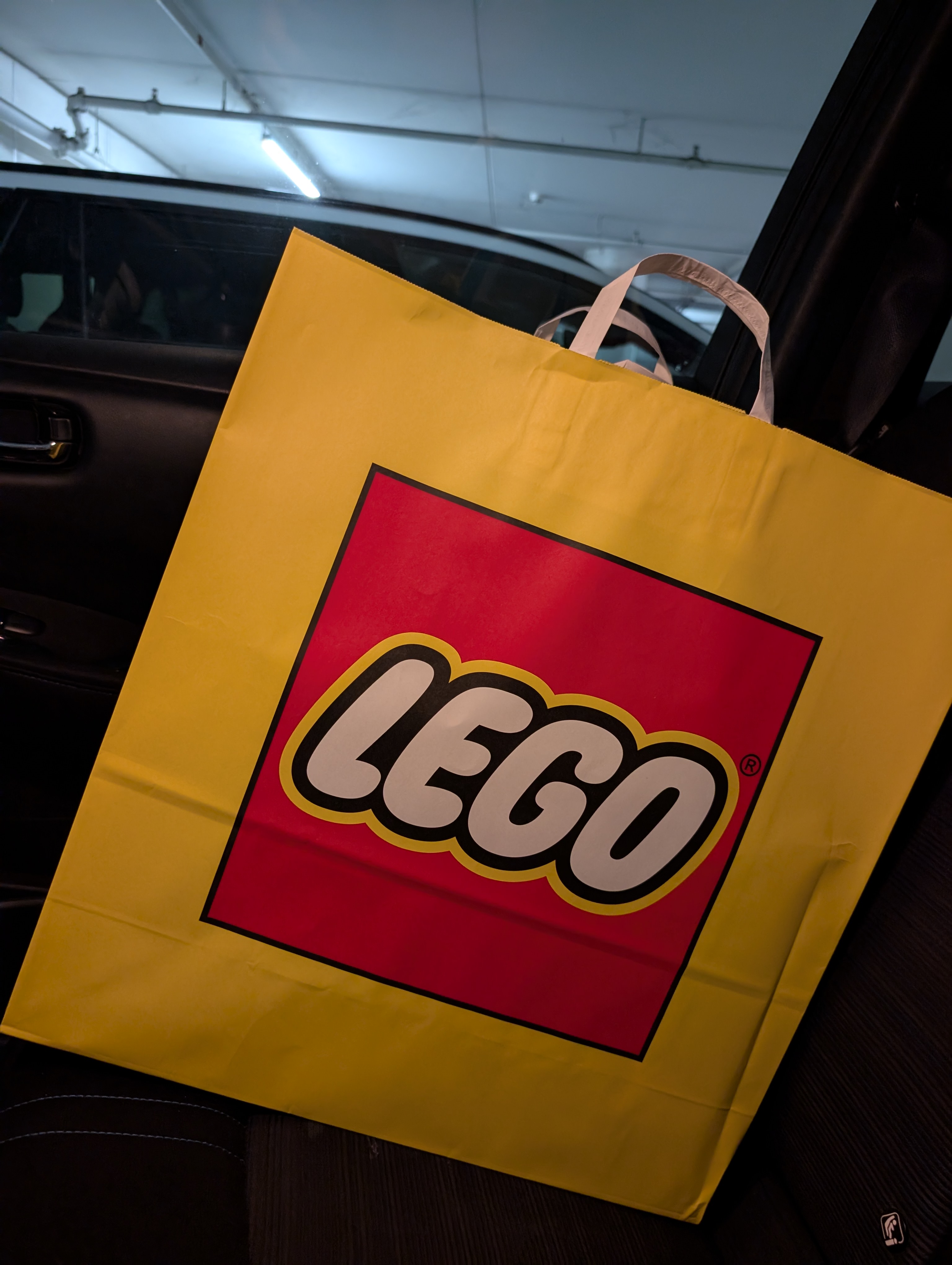 Big yellow bag with the lego logo