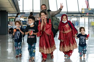 5 members of an Afghan family arriving in a US airport